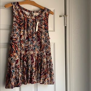 Anthropologie printed peplum sleeveless top